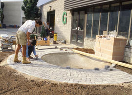 Photograph of Landscape students laying interlocking stone