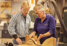 Photograph of student and faculty in the Cabinet Making/Woodworking program