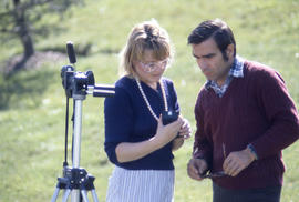 Photograph of an instructor and student working with a light meter