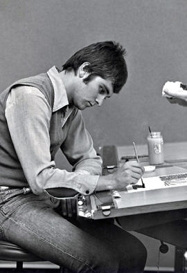 Photograph of R. Precious Using Watercolours to Make a Design Piece