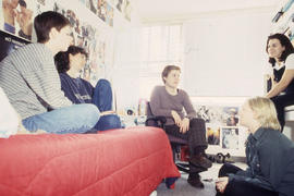 Photograph of students gathered in a residence dorm