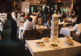 Photograph of People Being Served in the Humber Room by Hospitality Students
