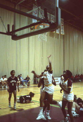 Photograph of Lady Hawks playing basketball against Seneca