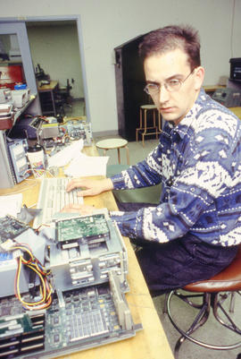 Photograph of a student in the Electronics program