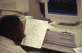 Photograph of an Architectural Technology student using the computer