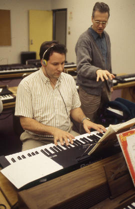 Photograph of a Music Student Practicing on an Electronic Keyboard