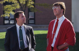 Photograph of two individuals on the walkway outside the Humburger