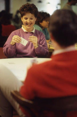 Photograph of students playing cards