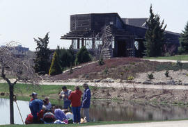 Photograph of a group of people in the arboretum