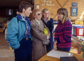Photograph of Christine Fraser and staff in the Arboretum