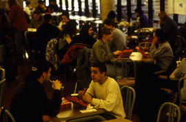 A photograph of students eating in the Pipe cafeteria