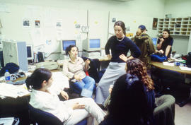 A photograph of students in the Journalism lab