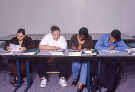 Photograph of students working on assignments in class