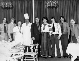 Photograph of Igor Sukor Standing with his Guests
