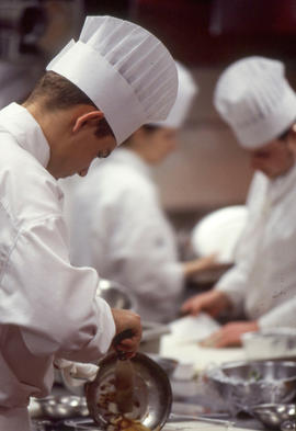 Photograph of culinary students at work