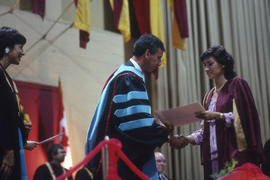 Photograph of President Robert Gordon and graduate