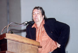 Photograph of Barry Callaghan at the podium