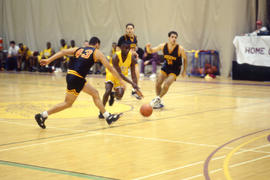 Photograph of a basketball game between Humber Hawks and an opposing team