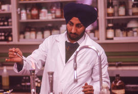 Photograph of a student working on an experiment in the chemistry lab