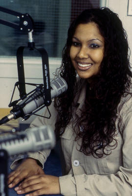 Photograph of student in Humber Radio broadcasting studio