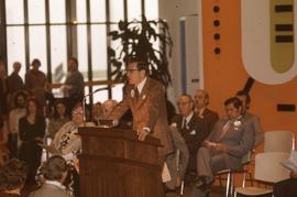 Person giving speech in the concourse : [photograph]