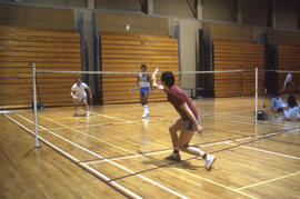 Photograph of students playing badminton in the Athletic Centre
