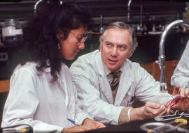 Photograph of instructor Gary Dunn and a student in the lab