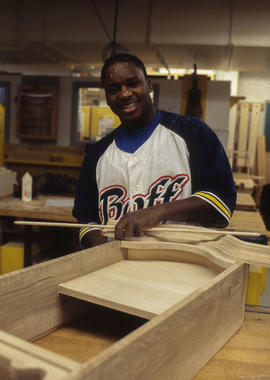 Photograph of a student working on a woodwork project