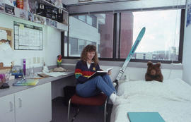 Photograph of a student in a student residence room