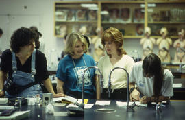A photograph of four Nursing students in the Anatomy lab at North.