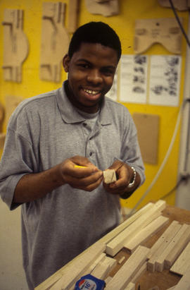 Photograph of a student working on a woodwork project
