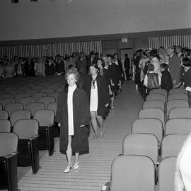Photograph of the graduates entering the auditorium