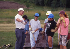 Photograph of grounds keeping crew ready to work