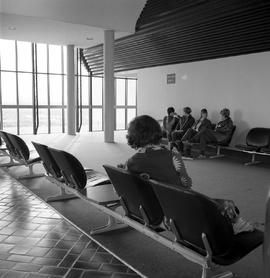 Photograph of students sitting in the student lounge area