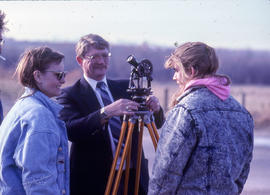 Photograph of a Civil Engineering professor working alongside his students