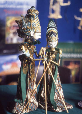 Photograph of two figurines from the international information event
