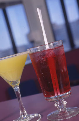 Photograph of mixed cocktails on table.