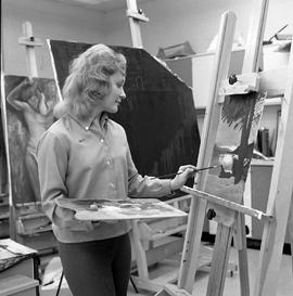 Photograph of Carol Curnow painting