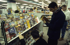 A photograph of students reading magazines in the Bookstore