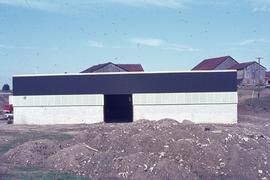 Horse stables and stable related building under construction : [photograph]