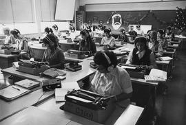 Photograph of Commercial Students Learning how to use Various Equipment for their Job Field