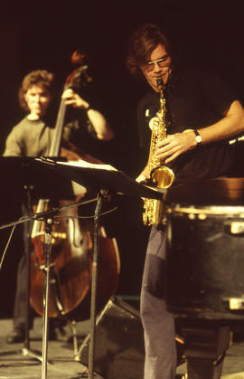 Photograph of a double bass and saxophone player at a Christmas concert