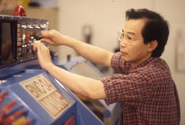 Photograph of a Student Using a Machine