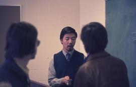 Wayson Choy teaching a communications class : [photograph]