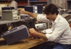 Photograph of a student in the electronics programme