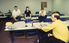 Photograph of students learning emergency response skills