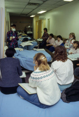 Photograph of Audrey Taves Demonstrating a Nursing Procedure to Students