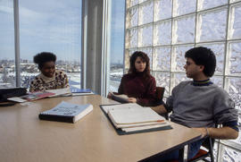 Photograph of students working on the top floor of the library