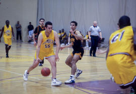 Photograph of the boys Humber Hawks basketball team in play