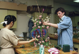 Photograph of students creating a floral arrangement